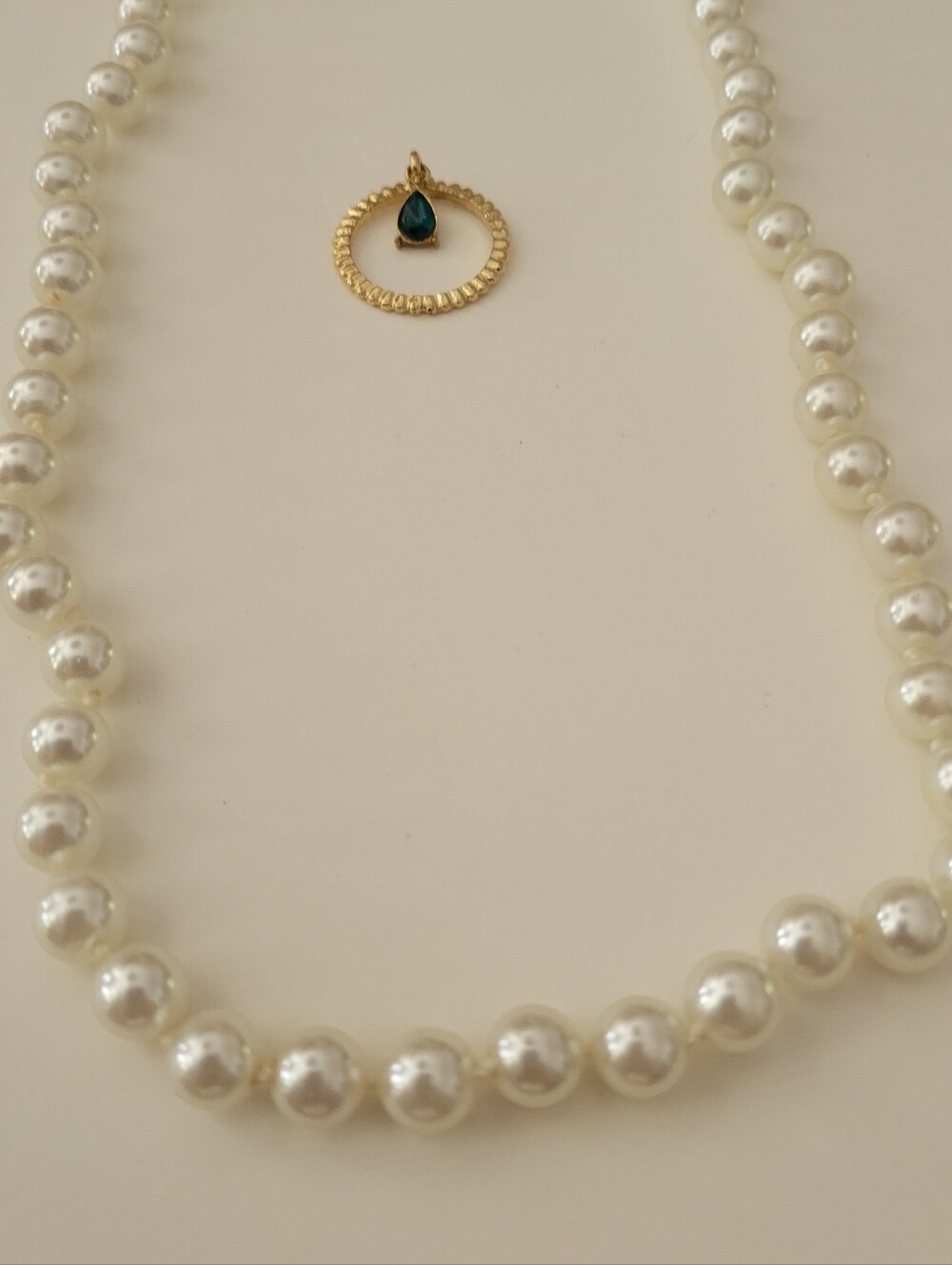 Pearl Beaded Necklace with Goldtone Ring and Emerald Teardrop Accent